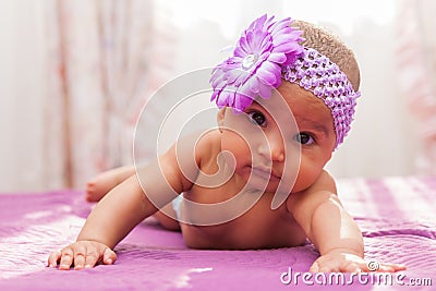 Adorable little african american baby girl looking - Black peopl