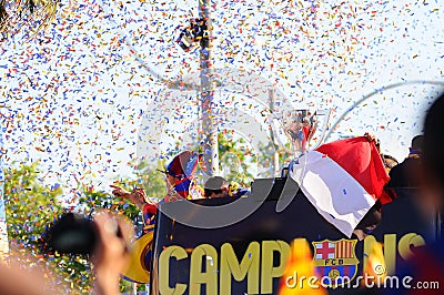 Adriano Correia, brasilian player of F.C Barcelona football team, celebrates surrounded by confetti, the title consecution of Span