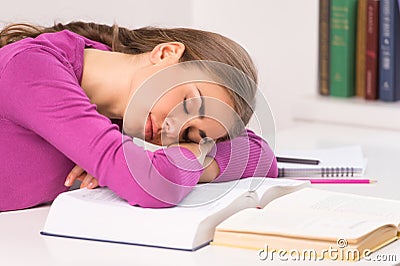 Adult student girl sitting and sleeping.