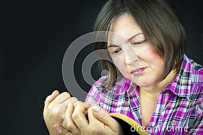 Adult Woman Reading a Bible