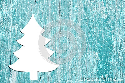 Advent background of old wood in turquoise and a christmas tree.