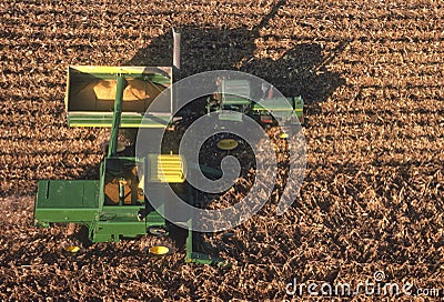 Aerial view of farm equipment in corn field