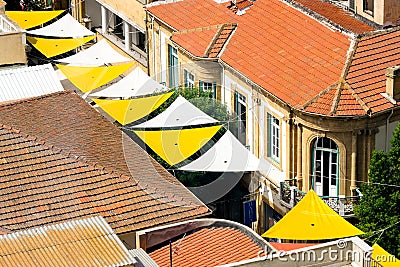 Aerial view on small street with sun-protective shades in Nicosia, Cyprus