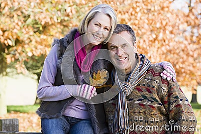 Affectionate senior couple on autumn walk