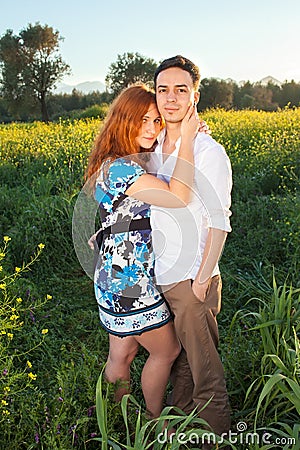 Affectionate young couple in the countryside