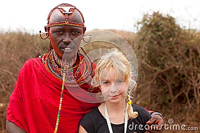 AFRICA, KENYA, MASAI MARA - JULY 2: Male tribal member wearing t