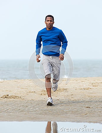 African American Man Jogging At Beach Stock Photo - Image: 39873354