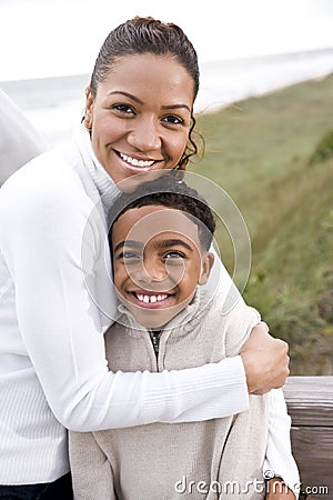 African-American mother and son at beach