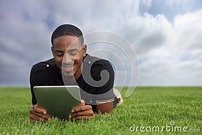 African American Student Reading Outdoors