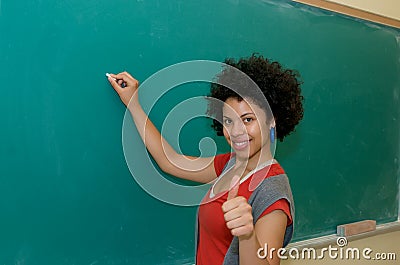 African american student thumbs up