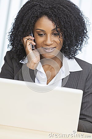 African American Woman Businesswoman Cell Phone Laptop