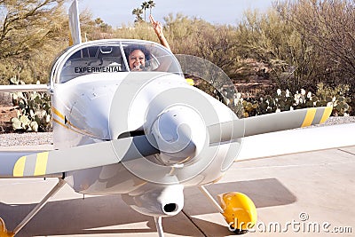 African American woman flying a private plane