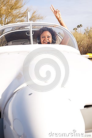 African American woman flying a private plane