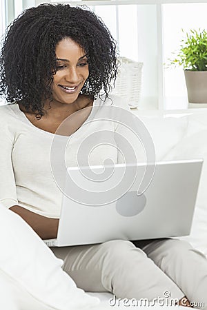 African American Woman, Laptop Computer at Home