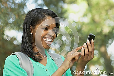 African American young woman on smart phone