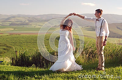 African bride and groom landscape