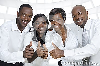 African business team / students thumbs up