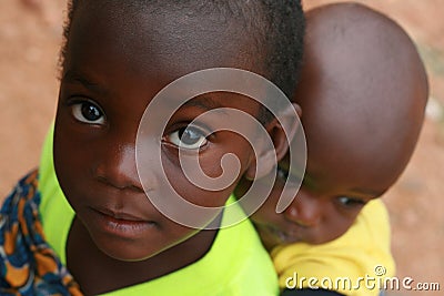 African child carrying little baby african way