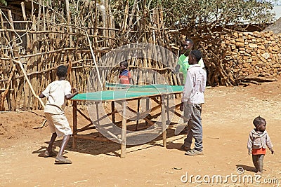 African children are playing table tennis