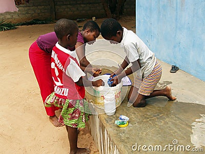 African children washing clothes