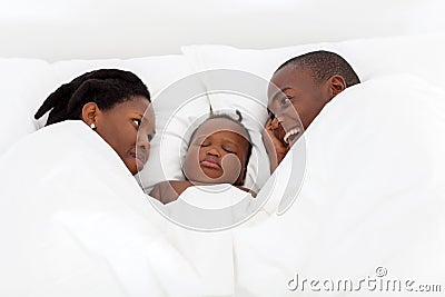 African family on bed
