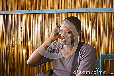 African man on phone