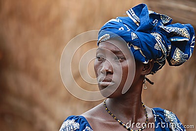 African woman in blue dress