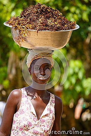 African woman carry things on her head