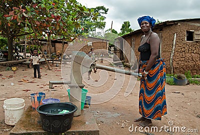 African woman fetching water