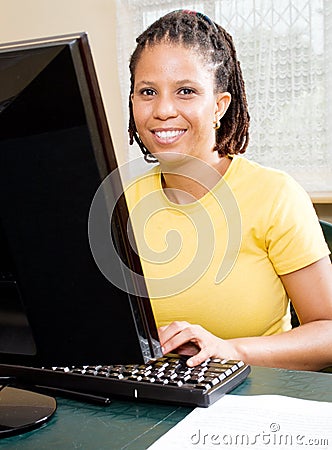 African woman learning computer