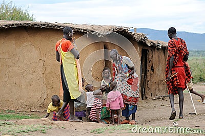 African women gives a bracelet to her children
