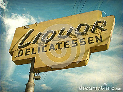 Aged vintage liquor store sign