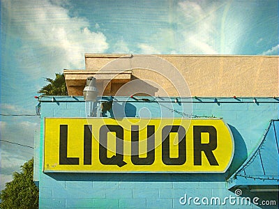 Aged and worn vintage liquor store sign