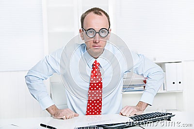 Aggressive businessman with a red tie and a blue shirt leave his