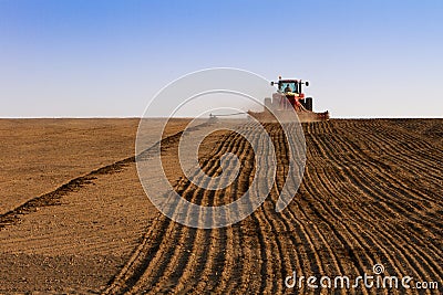 Agriculture tractor sowing seeds