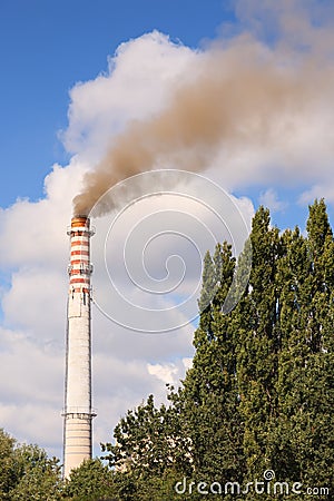 Air pollution coming from factory chimney