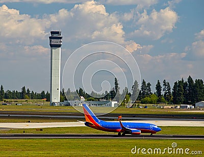 Air Traffic Control Tower and an Airplane