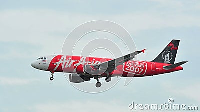 AirAsia Airbus A320 with special livery landing at Changi Airport
