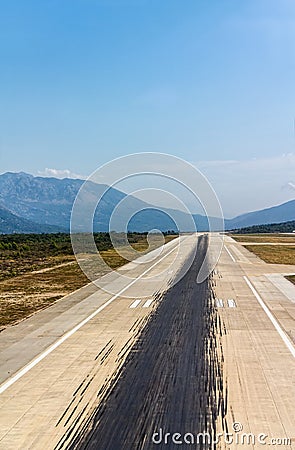 Aircraft tire tracks at airport runway