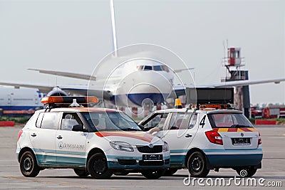 Airplane and airdrome car Follow Me