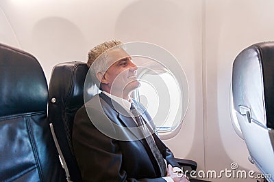 Airplane passenger relaxing