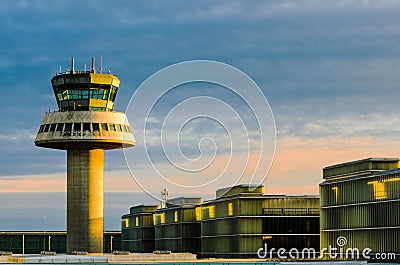 Airport control tower at sunset