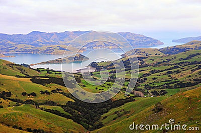 Akaroa Harbor lake and hills in New Zealand