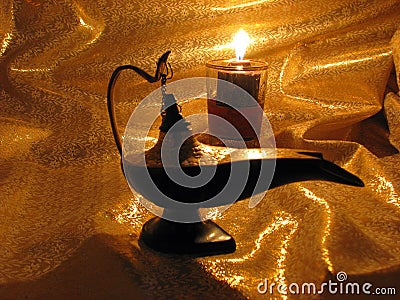 Aladdin s Lamp on Dark Gold Background