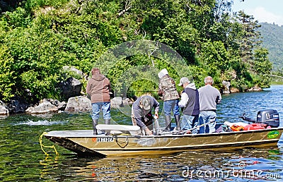 Alaska - Boat Full of People Fishing for Salmon
