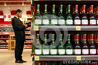 Alcohol and wine shopping at supermarket