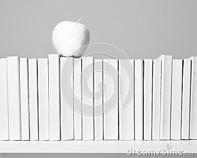All White Books with White Apple