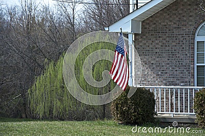 American flag on house porch