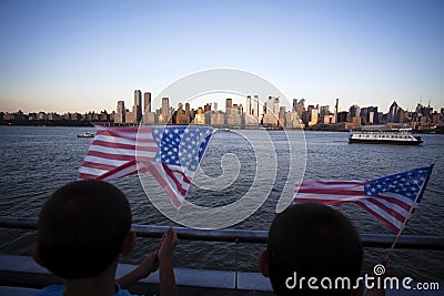American flag during Independence Day on the Hudson River with a view at Manhattan - New York City - United States