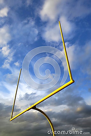 American Football Goal Posts over Dramatic Sky